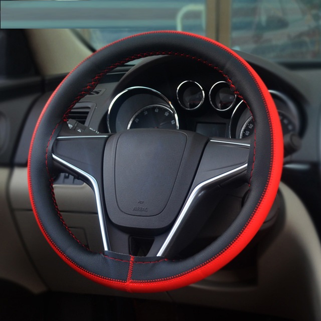 husa-volan-din-piele-naturala-neagra-cu-dunga-rosi_2361_6_1511292367.jpg Husa volan din PIELE NATURALA NEAGRA CU DUNGA ROSIE, pentru autoturisme, diametru 37 - 39 cm, cu ac si ata (se coase, aspect ORIGINAL) - imagine 1